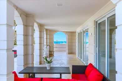 Live the Fisher Island lifestyle in this stunning 2 story beach on Fisher Island Club in Florida - for sale on GolfHomes.com, golf home, golf lot