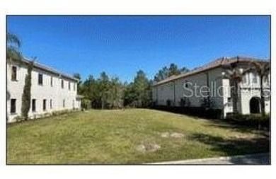BEST PRICED LARGE LOT IN REUNION AND BUILDING PLANS AVAILABLE ** on Reunion Resort Golf Course in Florida - for sale on GolfHomes.com, golf home, golf lot