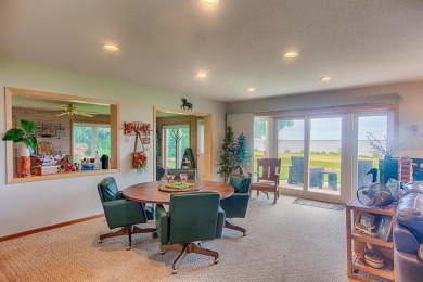 Step into comfort and convenience with this two-bedroom on Izatys Golf and Yacht Club in Minnesota - for sale on GolfHomes.com, golf home, golf lot