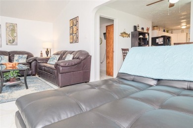 Charming and fully furnished 2-bedroom, 1-bath Cottage with a on Rockport Country Club in Texas - for sale on GolfHomes.com, golf home, golf lot
