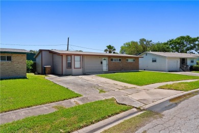 Welcome to 938 Woodlawn Drive, a charming one story home on Oso Beach Municipal Golf Course in Texas - for sale on GolfHomes.com, golf home, golf lot