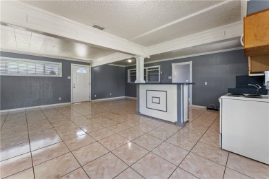 Welcome to 938 Woodlawn Drive, a charming one story home on Oso Beach Municipal Golf Course in Texas - for sale on GolfHomes.com, golf home, golf lot