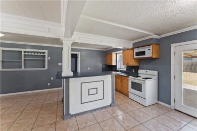 Welcome to 938 Woodlawn Drive, a charming one story home on Oso Beach Municipal Golf Course in Texas - for sale on GolfHomes.com, golf home, golf lot