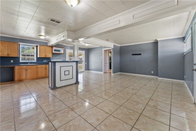 Welcome to 938 Woodlawn Drive, a charming one story home on Oso Beach Municipal Golf Course in Texas - for sale on GolfHomes.com, golf home, golf lot