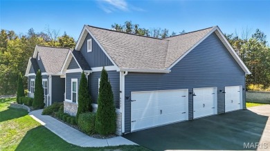 Welcome to the pampered life! This stunning, like-new on Raintree Country Club in Missouri - for sale on GolfHomes.com, golf home, golf lot