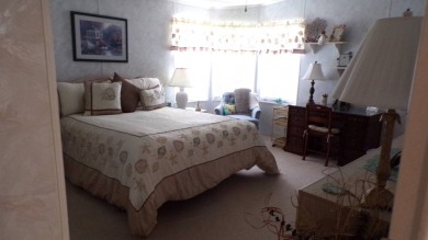 Embrace the allure of this remarkable 3-bedroom home, nestled on Schalamar Creek Golf and Country Club in Florida - for sale on GolfHomes.com, golf home, golf lot