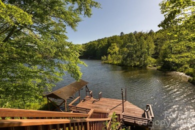 Lakefront living with both water and mountain views! Tucked away on Rumbling Bald Resort on Lake Lure in North Carolina - for sale on GolfHomes.com, golf home, golf lot