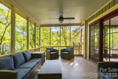 Lakefront living with both water and mountain views! Tucked away on Rumbling Bald Resort on Lake Lure in North Carolina - for sale on GolfHomes.com, golf home, golf lot