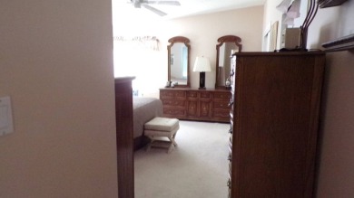 Embrace the allure of this remarkable 3-bedroom home, nestled on Schalamar Creek Golf and Country Club in Florida - for sale on GolfHomes.com, golf home, golf lot