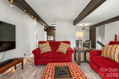 Lakefront living with both water and mountain views! Tucked away on Rumbling Bald Resort on Lake Lure in North Carolina - for sale on GolfHomes.com, golf home, golf lot