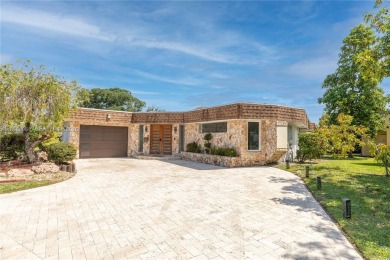 Welcome to this beautifully designed single-family home that on Woodlands Country Club in Florida - for sale on GolfHomes.com, golf home, golf lot