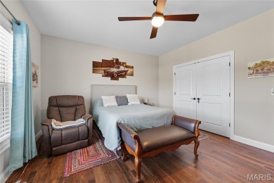 Welcome to the pampered life! This stunning, like-new on Raintree Country Club in Missouri - for sale on GolfHomes.com, golf home, golf lot