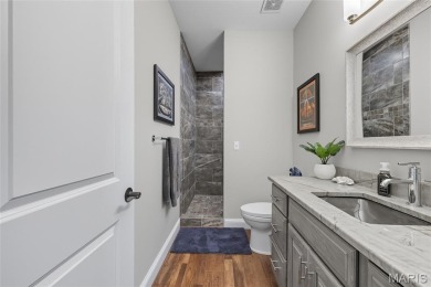 Welcome to the pampered life! This stunning, like-new on Raintree Country Club in Missouri - for sale on GolfHomes.com, golf home, golf lot