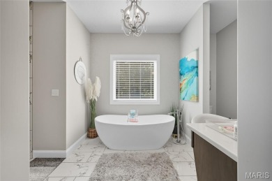 Welcome to the pampered life! This stunning, like-new on Raintree Country Club in Missouri - for sale on GolfHomes.com, golf home, golf lot