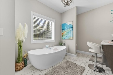 Welcome to the pampered life! This stunning, like-new on Raintree Country Club in Missouri - for sale on GolfHomes.com, golf home, golf lot