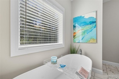 Welcome to the pampered life! This stunning, like-new on Raintree Country Club in Missouri - for sale on GolfHomes.com, golf home, golf lot