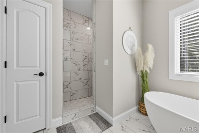 Welcome to the pampered life! This stunning, like-new on Raintree Country Club in Missouri - for sale on GolfHomes.com, golf home, golf lot