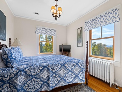 Set on 4.8 level acres w manicured lawns, this remarkable on Whiteface Club and Resort in New York - for sale on GolfHomes.com, golf home, golf lot