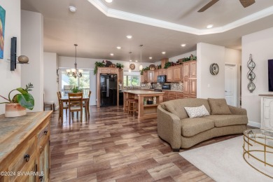 Upgraded features, beautiful, bright, and absolutely charming on Pine Shadows Golf Course in Arizona - for sale on GolfHomes.com, golf home, golf lot
