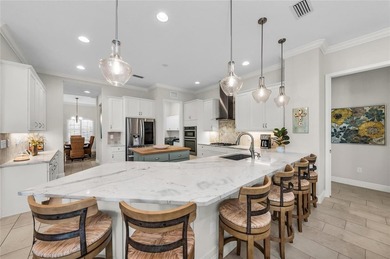 Welcome to a stunning 4-bedroom, plus office, home nestled in on IMG Academies Golf and Country Club in Florida - for sale on GolfHomes.com, golf home, golf lot