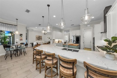 Welcome to a stunning 4-bedroom, plus office, home nestled in on IMG Academies Golf and Country Club in Florida - for sale on GolfHomes.com, golf home, golf lot