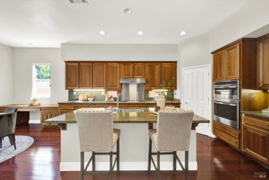 Discover elegant living in this expansive 4++ bedroom, 4-bath on Hiddenbrooke Golf Club in California - for sale on GolfHomes.com, golf home, golf lot