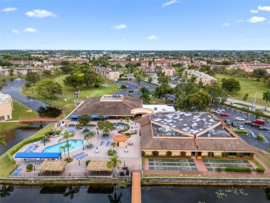 Unmatched Views  Prime Location in 55+ Community! Wake up to on Sunrise Lakes Phase III in Florida - for sale on GolfHomes.com, golf home, golf lot