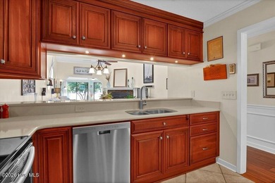 Sunny and bright townhome just minutes from Wrightsville Beach on Inland Greens Golf Course in North Carolina - for sale on GolfHomes.com, golf home, golf lot