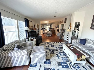 1700+ S.F. 2/bd, 2/ba home w/ Den is situated on a beautiful on Del Tura Golf and Country Club in Florida - for sale on GolfHomes.com, golf home, golf lot
