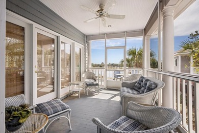 Enjoy breathtaking views across three bodies of water from this on DeBordieu Country Club in South Carolina - for sale on GolfHomes.com, golf home, golf lot