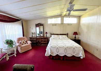 This pretty home is waiting for someone to give it some love on Del Tura Golf and Country Club in Florida - for sale on GolfHomes.com, golf home, golf lot