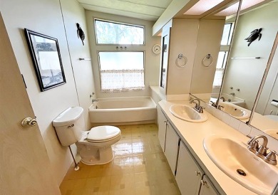 This pretty home is waiting for someone to give it some love on Del Tura Golf and Country Club in Florida - for sale on GolfHomes.com, golf home, golf lot