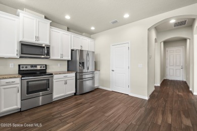 Charming and spacious Loren Cove townhome with oversized on Duran Golf Course in Florida - for sale on GolfHomes.com, golf home, golf lot