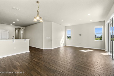 Charming and spacious Loren Cove townhome with oversized on Duran Golf Course in Florida - for sale on GolfHomes.com, golf home, golf lot