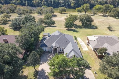 Welcome to 9304 Ravenswood Road, an exceptional RIVERFRONT on Pecan Plantation Country Club in Texas - for sale on GolfHomes.com, golf home, golf lot