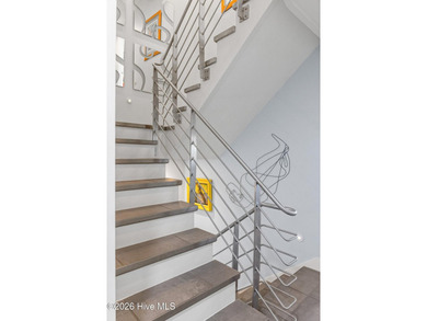 Along Cape Fear Trail on Bald Head Island, this architecturally on Bald Head Island Golf Club in North Carolina - for sale on GolfHomes.com, golf home, golf lot