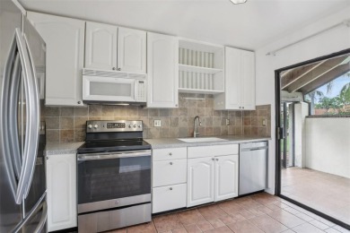 Stylishly Renovated 2-Bedroom, 2-Bath Villa in The Meadows - on The Meadows Golf and Country Club in Florida - for sale on GolfHomes.com, golf home, golf lot