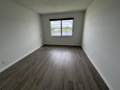 Enjoy expansive, picturesque water views from this completely on Leisureville Community Golf Course in Florida - for sale on GolfHomes.com, golf home, golf lot