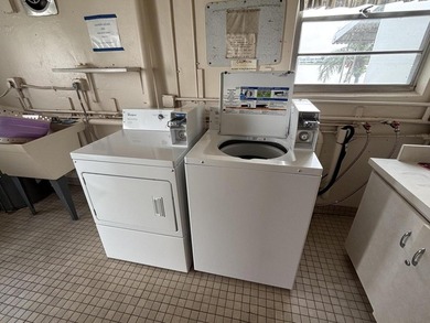 Enjoy expansive, picturesque water views from this completely on Leisureville Community Golf Course in Florida - for sale on GolfHomes.com, golf home, golf lot