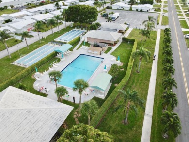 Enjoy expansive, picturesque water views from this completely on Leisureville Community Golf Course in Florida - for sale on GolfHomes.com, golf home, golf lot