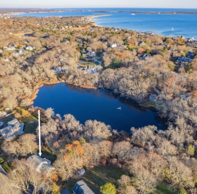 Waterfront on Schoolhouse Pond, this Hyannis Port gem combines on Hyannisport Club in Massachusetts - for sale on GolfHomes.com, golf home, golf lot