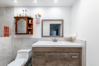 BACK ON THE MARKET Feels like a 3-bedroom home. This spacious on Woodlands Country Club in Florida - for sale on GolfHomes.com, golf home, golf lot