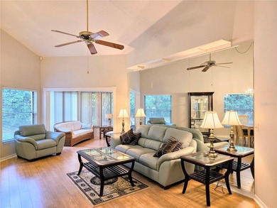 One or more photo(s) has been virtually staged. Beautiful villa on Seven Springs Golf and Country Club in Florida - for sale on GolfHomes.com, golf home, golf lot