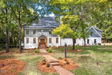 Indulge in the epitome of luxurious living in this exquisite on Chapel Hill Country Club in North Carolina - for sale on GolfHomes.com, golf home, golf lot