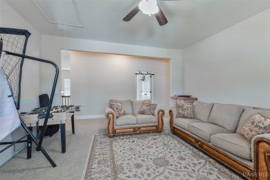 This Charleston-style home offers 4 bedrooms, 3.5 bathrooms, and on Capitol Hill Golf Course in Alabama - for sale on GolfHomes.com, golf home, golf lot