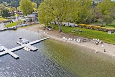 Does year-round deeded beach access with 300 ft of BEACHFRONT on Liberty Lake Golf Club in Washington - for sale on GolfHomes.com, golf home, golf lot