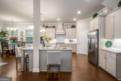 Located in Lakeview-Heron Bay's only gated section-this elegant on Canongate At Heron Bay in Georgia - for sale on GolfHomes.com, golf home, golf lot