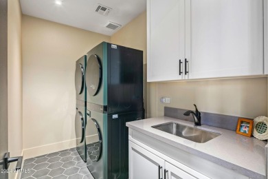 Discover this beautiful, turnkey, designer townhome at The on Desert Mountain Golf Club - Renegade Course in Arizona - for sale on GolfHomes.com, golf home, golf lot