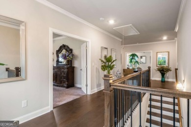 Located in Lakeview-Heron Bay's only gated section-this elegant on Canongate At Heron Bay in Georgia - for sale on GolfHomes.com, golf home, golf lot