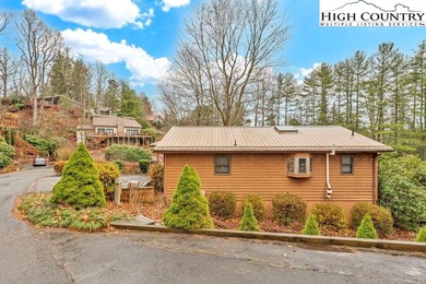 Welcome to 36 Larskpur, a beautiful mountain retreat nestled in on Land Harbor Golf Course in North Carolina - for sale on GolfHomes.com, golf home, golf lot